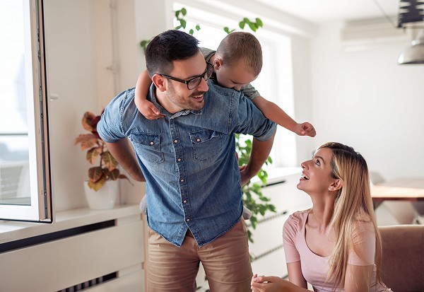 A family that banks at Waldo State Bank spend time together at home.