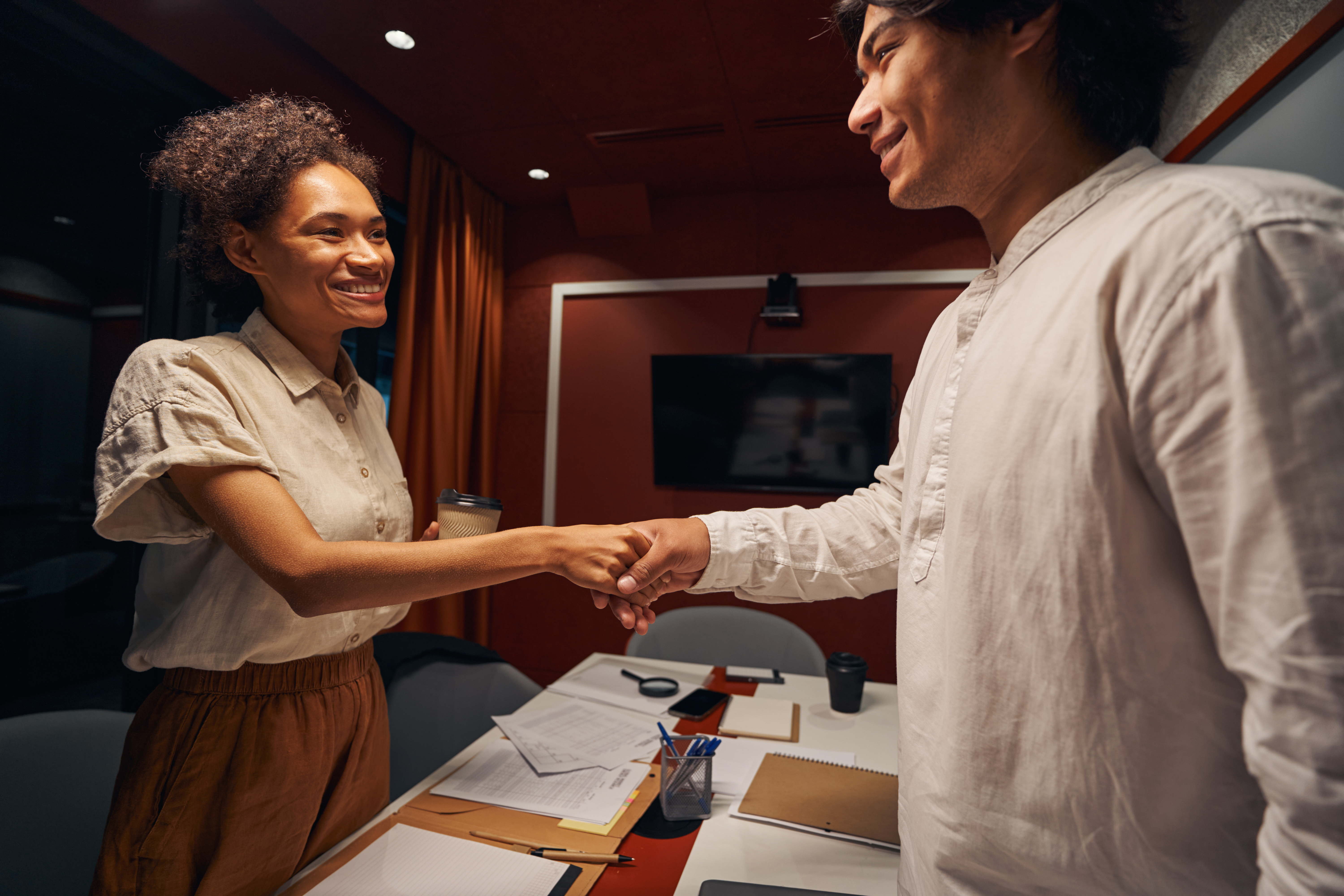 American employee is shaking hands with colleague